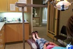 Ness Family Dentistry girl getting teeth cleaned